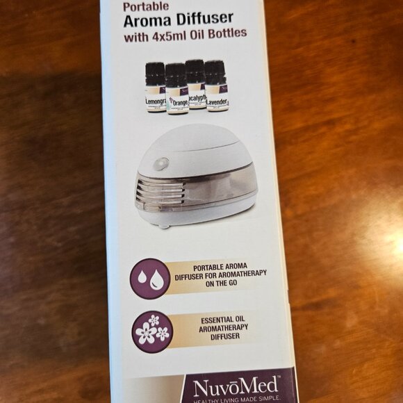 New one NUVOMED PORTABLE AROMA DIFFUSER W/ 4 X 5ml OIL BOTTLES included - Picture 4 of 6